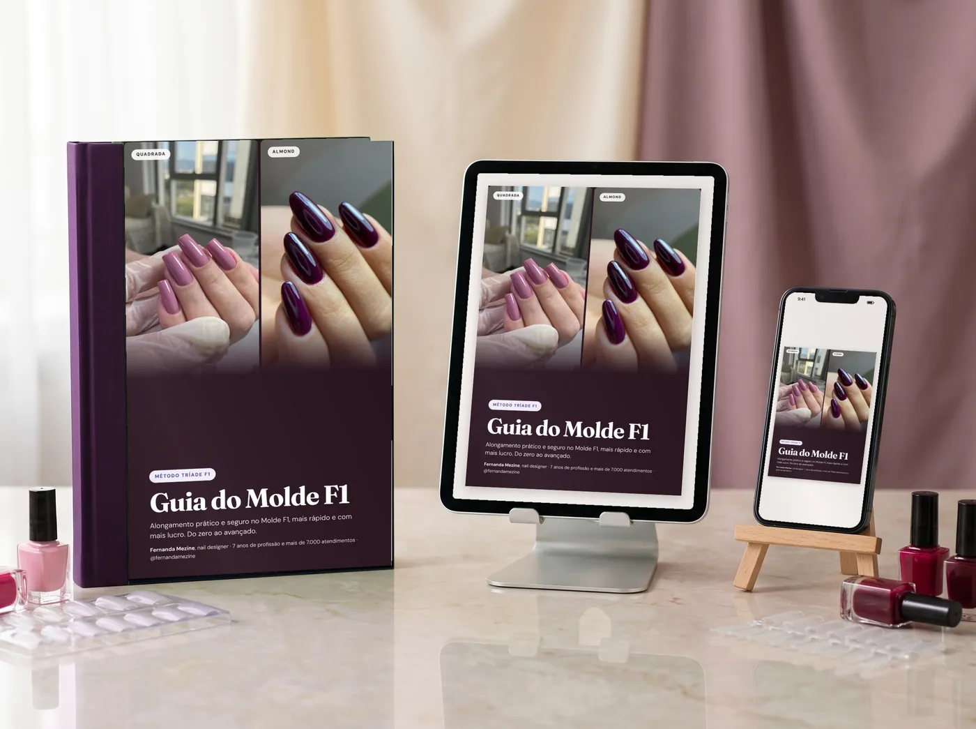 O Guia do Molde F1 com a capa nova: impresso, no tablet e no celular, numa mesa de mármore com esmaltes.